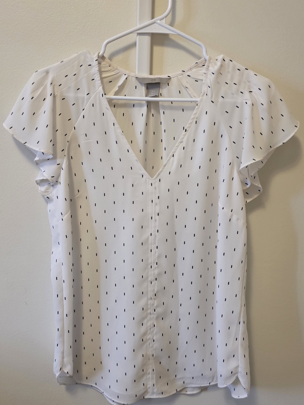 H&M White V-Neck Blouse with Black Dash Pattern